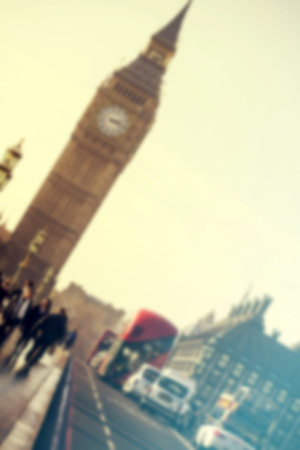  Big Ben in Westminster with red London Buses and traffic. Blurred background.の写真素材