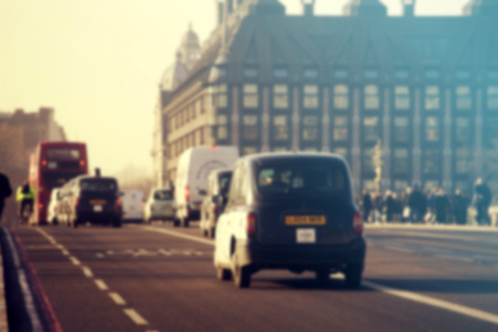Big Ben in Westminster with blaack cab and London traffic. Blurred backgroundの写真素材