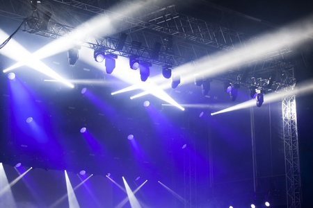 Reflector lights at an electronic music concert at nightの写真素材