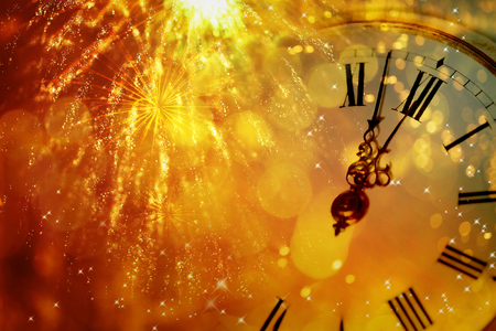 New Year's at midnight - Old clock with stars snowflakes and holiday lightsの写真素材