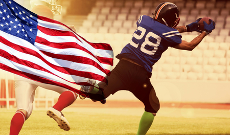 Blurred background of american football game, american flag in the focusの写真素材