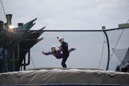 Cluj-Napoca, Romania - August 3, 2017: Man flying in air-tube, skydiving show at Untold Festival, the Best Major Music Festival of Europeのeditorial素材