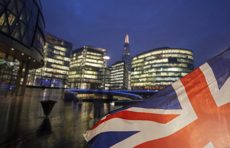 Brexit concept - UK economy after Brexit deal -  EU flag and London business center combinedの写真素材