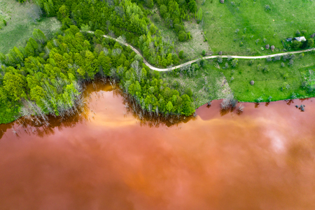 Flooded and abandoned village in the middle of a lake contaminated with cyanide at Geamana, near Rosia Montana, Romania.の写真素材