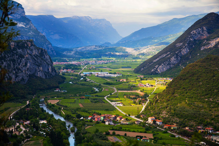Small village surrounded by mountains near Lake Garda, Italyの写真素材