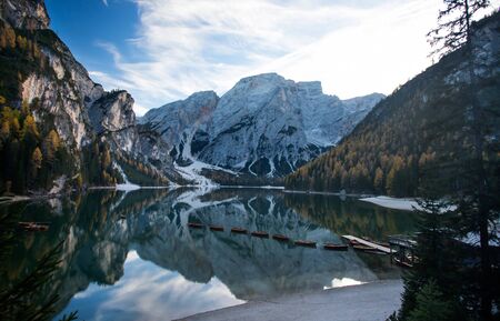 Amazing view of Lago di Braies (Pragser Wildsee), one of the most beautiful lake in South Tirol, Dolomites mountains, Italy. Popular tourist attraction.の写真素材