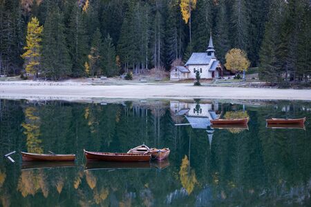 Amazing view of Lago di Braies (Pragser Wildsee), one of the most beautiful lake in South Tirol, Dolomites mountains, Italy. Popular tourist attraction.の写真素材