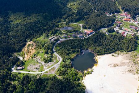Aerial view of small ski resort in the summer in the Carpathian mountains in Romania.の写真素材