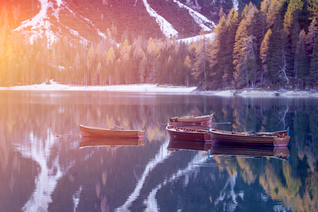 Magic sunset at Lago di Braies (Pragser Wildsee), Dolomites mountains, Italy. Popular tourist attraction.のeditorial素材