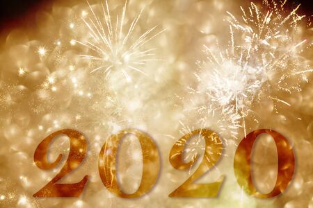 New Year 2020 celebration. Magic holiday background with fireworks.