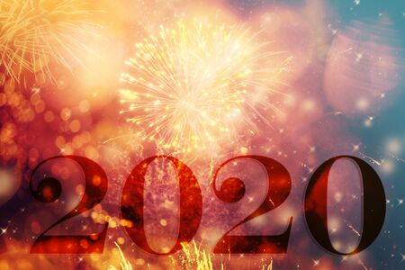 New Year 2020 celebration. Magic holiday background with fireworks.