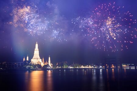 Exotic New Year - Celebrating the New Year in Bangkok with fireworks at Wat Arun Temple, Bangkok, Thailandの写真素材