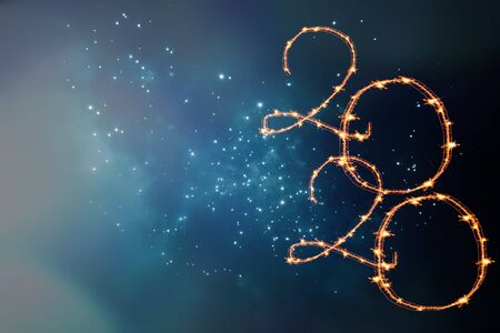 New Year 2020 celebration. Magic holiday background with fireworks. Number 2020 written sparkling...