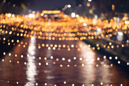 Christmas lights, Christmas decorations on the street. Blurred background city street with Christmas...