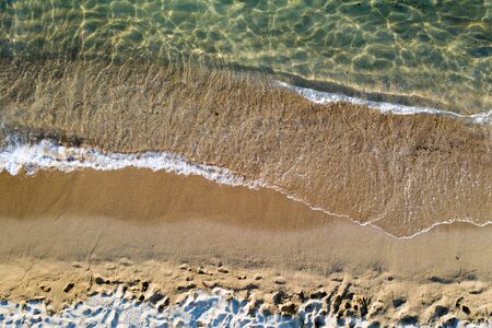 Top view aerial image from drone of an stunning beautiful  beach with turquoise water.