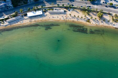 Small sandy beach in Kavala, Greece. Aerial, drone view.