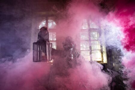 Post apocalyptic survivor in gas mask in the smoke. Environmental disaster, armageddon concept.の写真素材