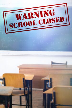 COVID-19 - Coronavirus pandemic - 2019-nCoV concept. Empty classroom with a the text of Closed school. Many countries orders closure of all schools and universities due to coronavirus outbreak.の写真素材