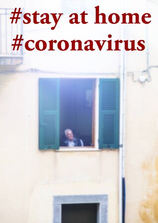 Staying at home with self quarantine to help slow outbreak and protect coronavirus spread.Italian village street with stay at home text.の写真素材