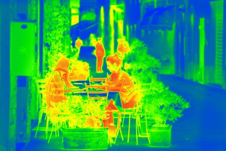 Thermal scanner detecting infected people with Covid-19. Coronavirus spread control concept.の写真素材