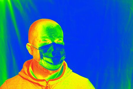 Thermal scanner detecting infected people with Covid-19. Coronavirus spread control concept.の写真素材