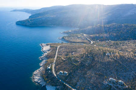 Aerial view of blue ocean with crystal clear turqouise water of Thassos island, Greece