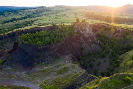 Aerial view of  Racos volcanic crater in the sunrise, Brasov county, Romania