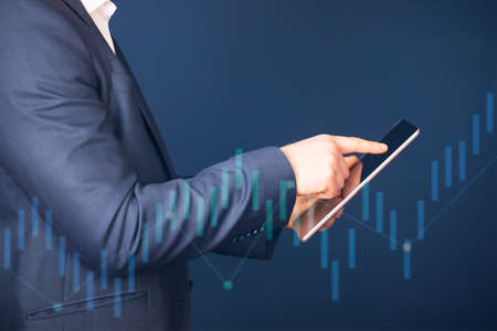 Business man using modern digital tablet. Concept of networking or social connection. Global...