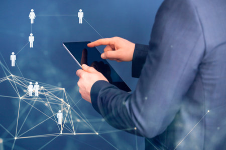 Business man using modern digital tablet. Concept of networking or social connection. Global...