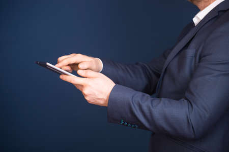 Business man using modern digital tablet. Concept of networking or social connection. Global business network.の写真素材