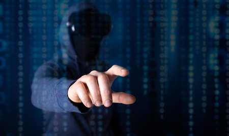 Hacker coding virus ransomware using laptops and computers. Cyber attack, system breaking and...