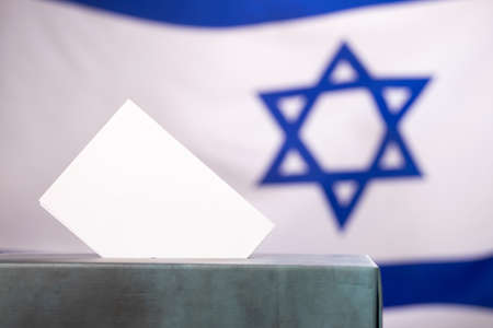 Israel election banner background. Ballot Box with blurred flagの写真素材