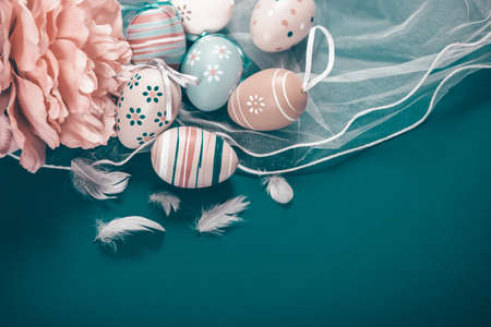 Happy Easter. Congratulatory easter background. Easter eggs and flowers.