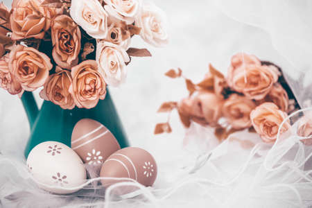 Happy Easter. Congratulatory easter background. Easter eggs and flowers.