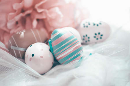 Happy Easter. Congratulatory easter background. Easter eggs and flowers.