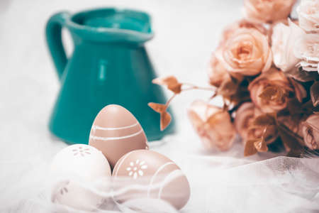 Happy Easter. Congratulatory easter background. Easter eggs and flowers.の写真素材