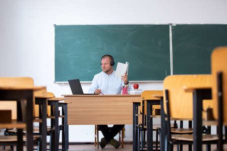 Back to School Concept. School math teacher giving virtual teaching remote class online lesson on...