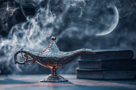 Ramadan Kareem festive greeting card for Muslim holy month with Aladdin lamp of wishes and Quran