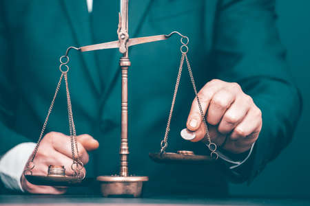 Concept of earning balance with businessman that weighs the money