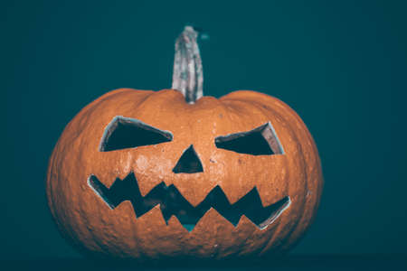 Jack O' Lanterns glowing in the night. Halloween backgroundの写真素材