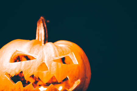 Jack O' Lanterns glowing in the night. Halloween backgroundの写真素材