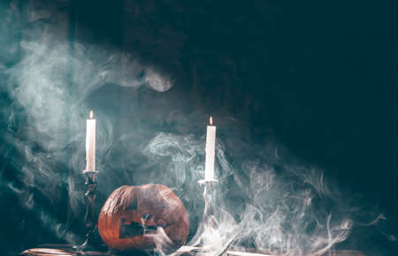 Jack O' Lantern glowing in smoky fantasy night. Halloween backgroundの写真素材