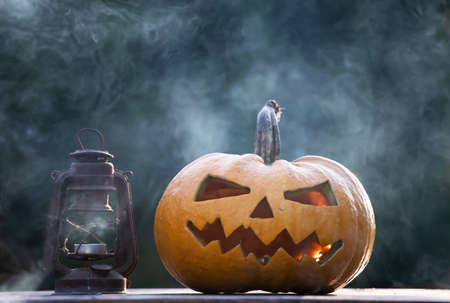 Jack O' Lantern glowing in smoky fantasy night. Halloween backgroundの写真素材