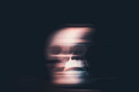 Scary grunge abstract skull wallpaper. Halloween background.の写真素材