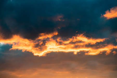 Dramatic stormy sky with colorful clouds. World environment day conceptの写真素材