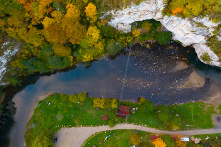 Aerial drone view of Crisul Repede river, near to Ungurul Mare cave. Apuseni mountains, Bihor, Romania.の写真素材