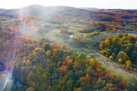 Aerial view of authentic traditional villages from Apuseni area in Romania during sunny autumn dayの写真素材