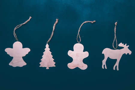 Christmas wooden decoration on vintage black background