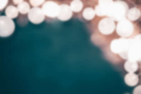 Christmas lights on vintage black backgroundの写真素材