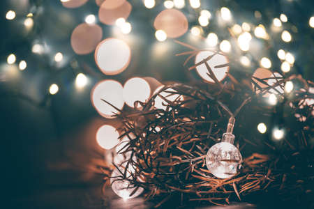 Christmas moody style background with candy jar and Christmas decoration on sparkling lightsの写真素材